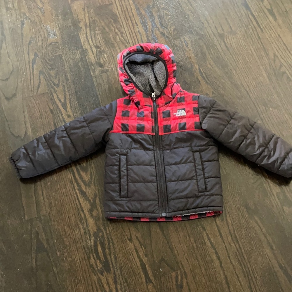 Boys reversible north face coat.